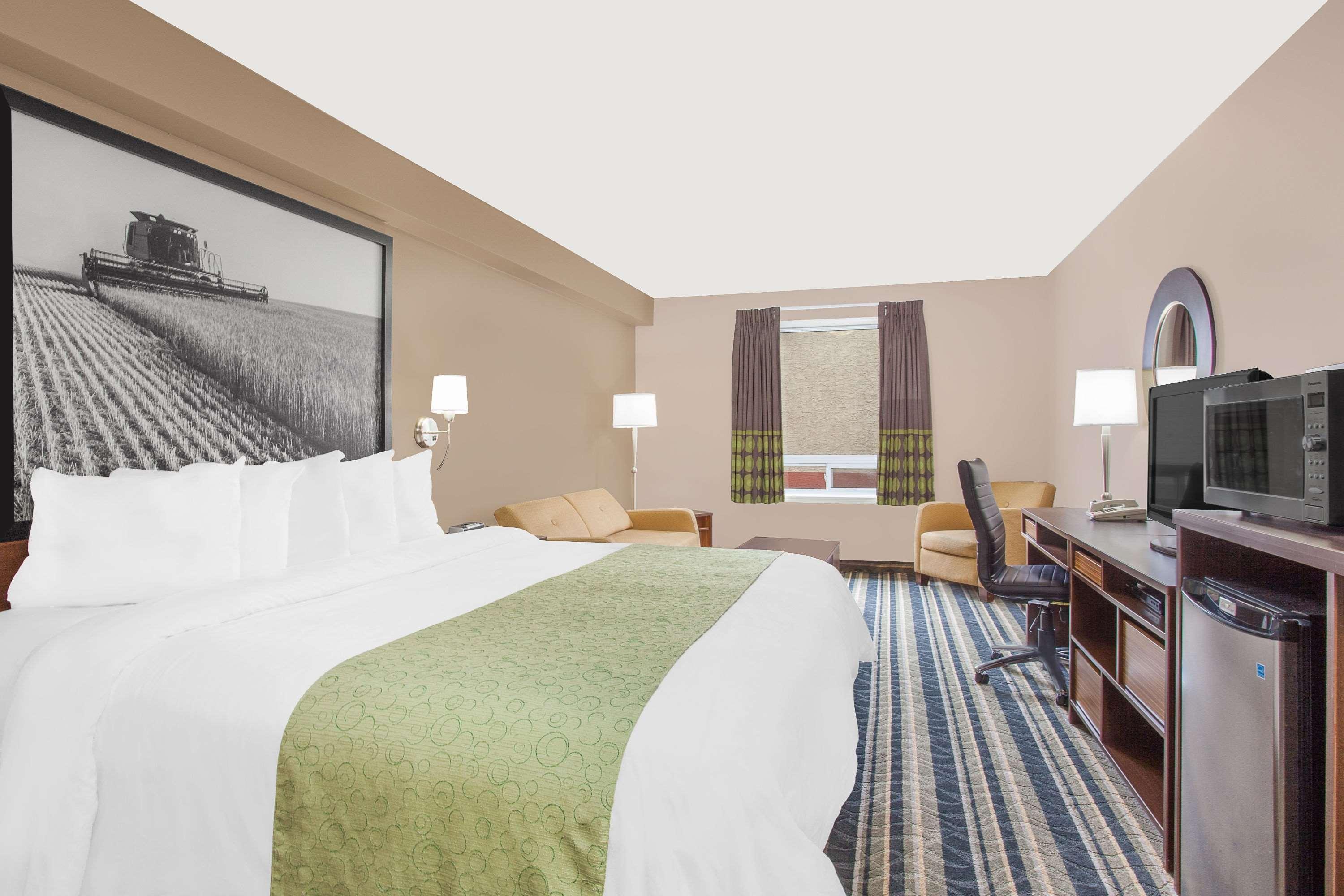 Motel Super 8 By Wyndham Brandon Mb Esterno foto